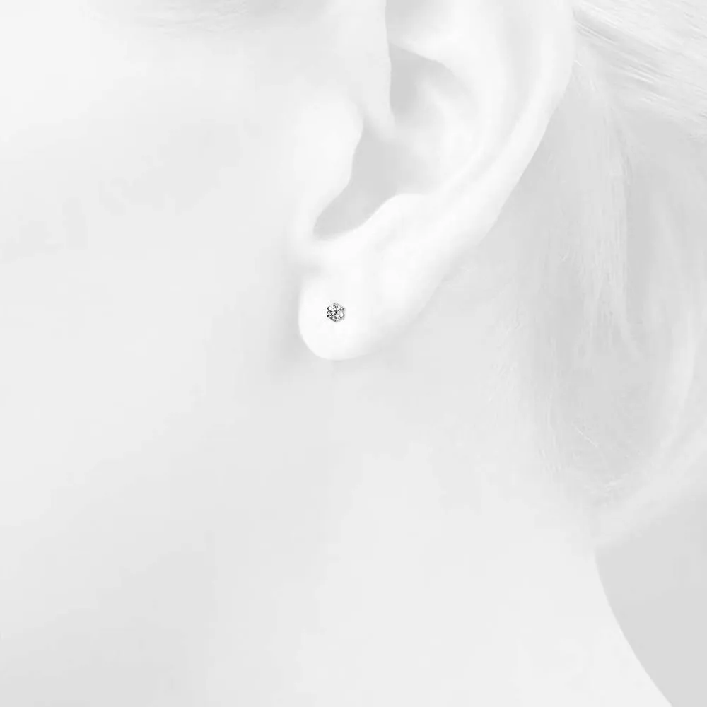 0.1ct Starlit Solitaire Diamond Stud Earrings Encased in 18k White Gold