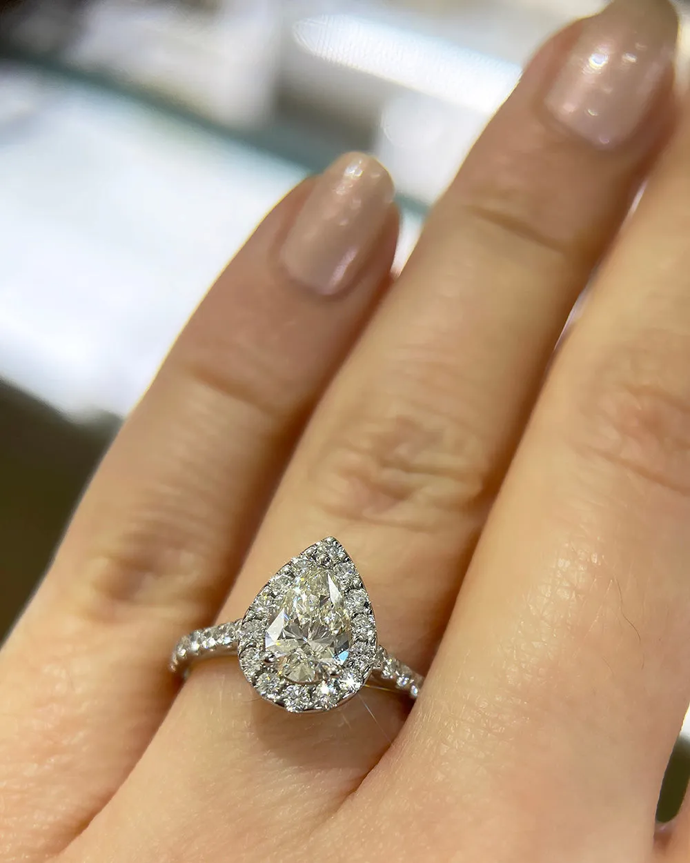 1 ct Pear Cut Lab-Grown Diamond 18k Gold Modern Halo Engagement Ring